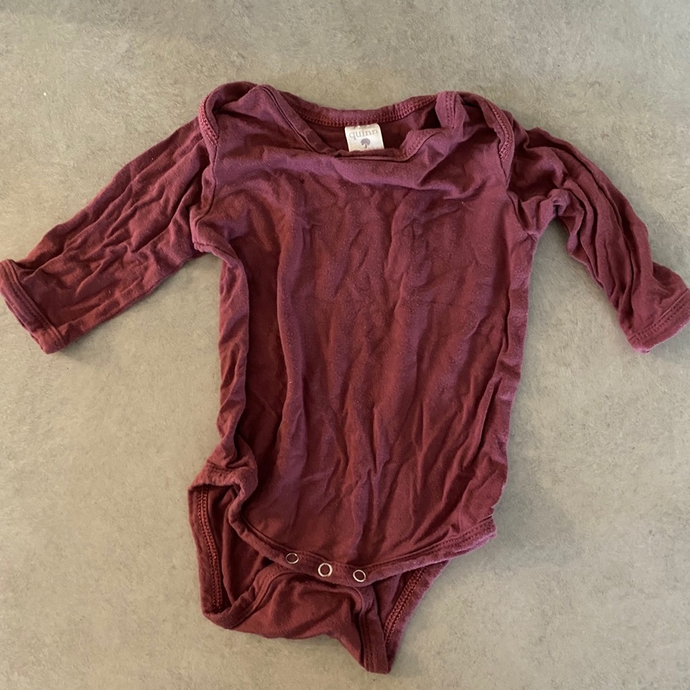 Kate Quinn onesie